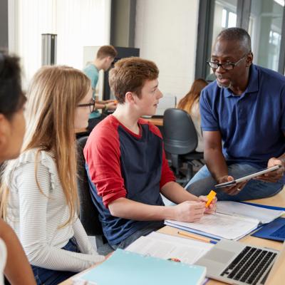 Students looking at teacher